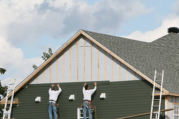 Professional Storm Damage Siding Repair technician working in Far Hills, NJ